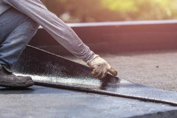 Professional Basement Waterproofing technician working in Goddard, KS